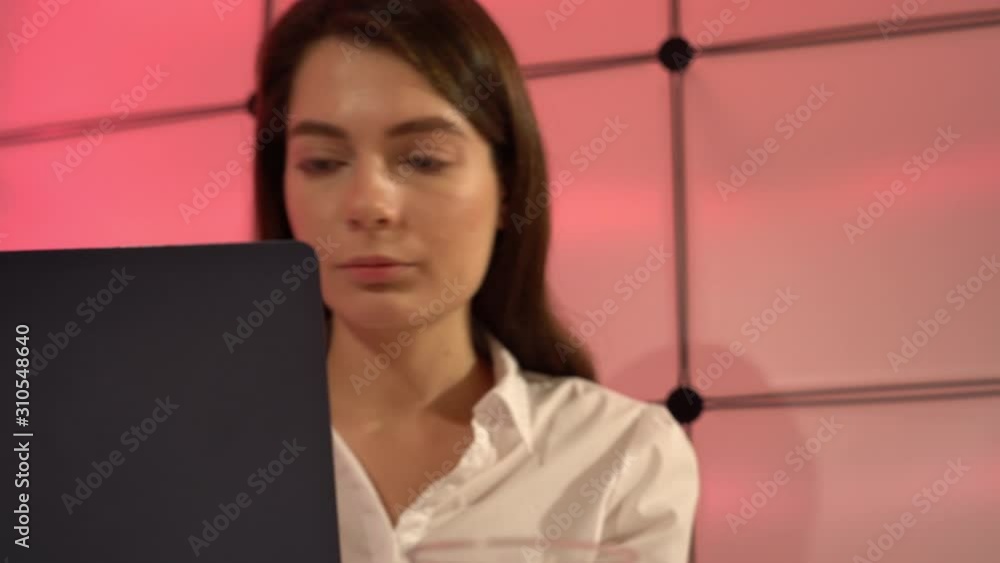 Canvas Prints Female laboratory assistant is processing genetic analysis data. PCR robot in a reproductive medicine laboratory.