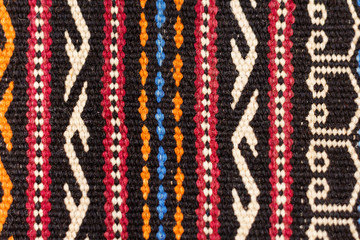 Aztec embroidered pattern color stitches blanket symmetry