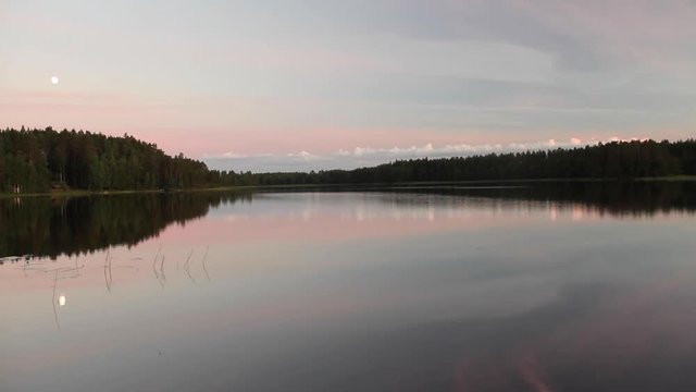  calm Finnish lake just before sunset