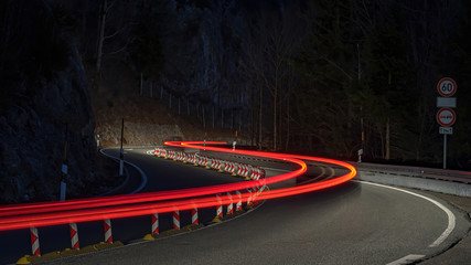 Red light trails of car at night 