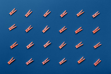 Pattern with coral clothes pins in classic blue. Horizontal