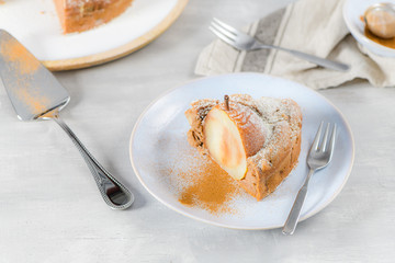 Delicious cake slice with pear and cinnamon