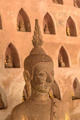 Statues of Buddha at Wat Sisaket temple in Vientiane, Laos.