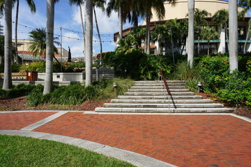 A photo leading up to an artistic, modern,new building