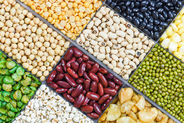 Box of different whole grains beans and legumes seeds lentils and nuts colorful snack texture background - Collage various beans mix peas agriculture of natural healthy food for cooking ingredients