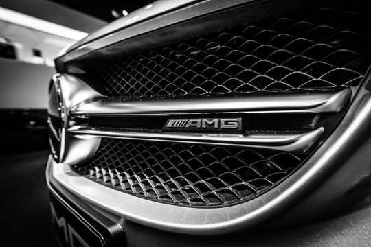 BERLIN - DECEMBER 21, 2017: Showroom. Detail of the mid-size car Mercedes-Benz C-Class AMG C63 (W205). Black and white. Since 2015.