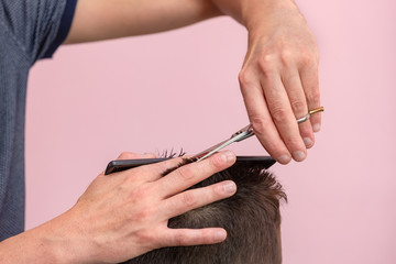 Hairdresser cutting a child's hair