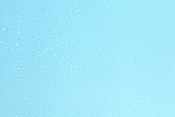 Close up water drops on blue background, Water drop in macro photography