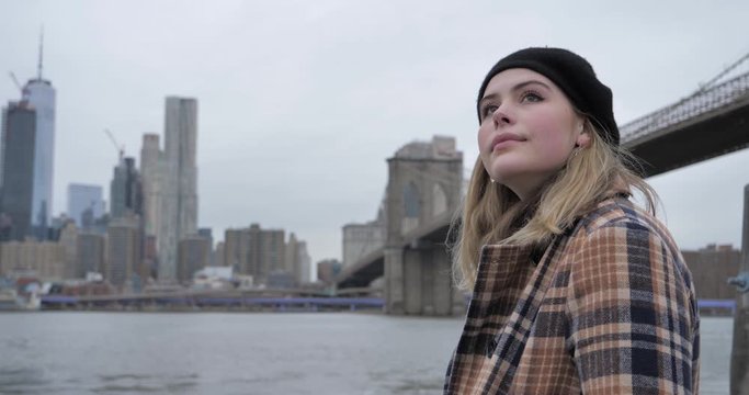 City lifestyle of inspired attractive young woman enjoying winter time in NYC