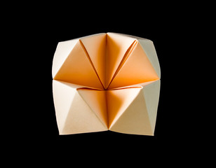 paper fortune teller isolated on black background.