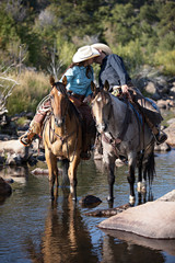 Kissing Cowboy and Cowgirl