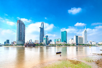 Skyscrapers along river with architecture office towers, hotels, center cultural and commercial development country most in Ho Chi Minh city, Vietnam