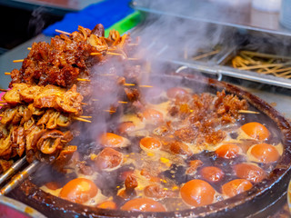 Close up shot of the traditional Pork knuckles and ginger stew