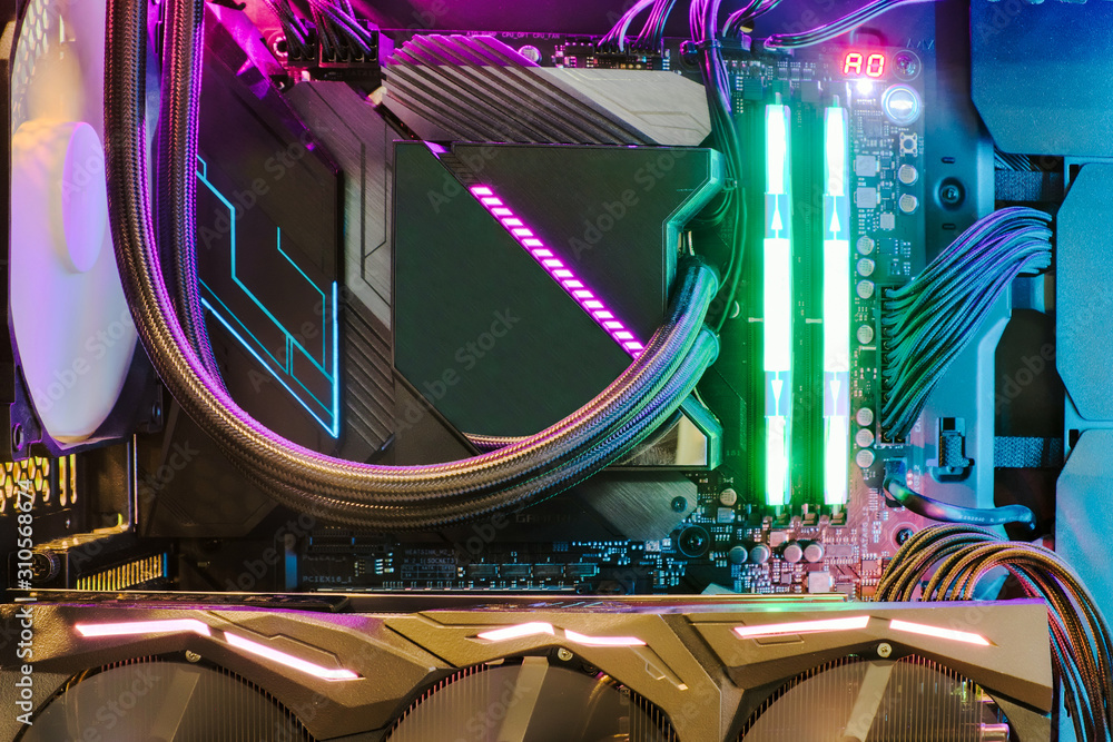 Poster close-up and inside desktop pc gaming and cooling fan cpu system with multicolored led rgb light sho