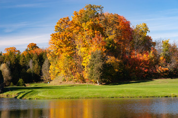 landscape fall foliage and lake at Golf Course