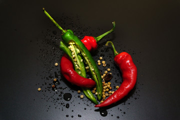 Chili peppers on a black background.