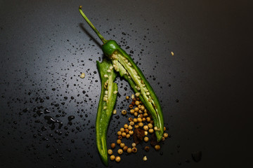 Chili peppers on a black background.