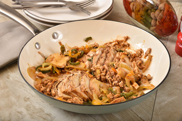 Chicken fajita in a cast iron skillet