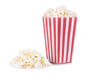 Popcorn in red and white cardboard box isolated on white background