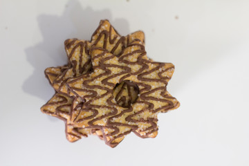 Star shape cookie with chocolate and sugar on the top