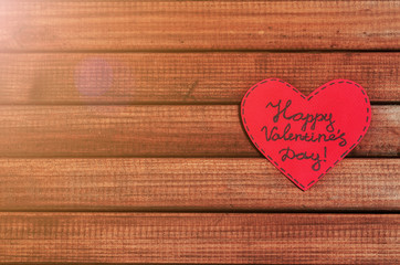 Cut out of red paper hearts on wooden background, congratulation with Valentine's day, top view - 310573831