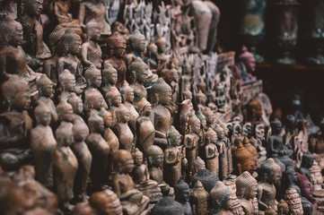 Thousands of statuettes of Buddha at the souvenir street market in Phnom Penh, Cambodia