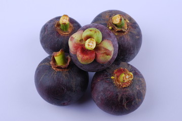 asian tropical mangosteen fruit on white background