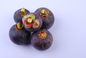 asian tropical mangosteen fruit on white background