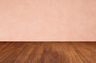 Empty wooden floors on pink wallpaper background