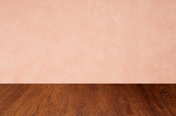 Empty wooden floors on pink wallpaper background