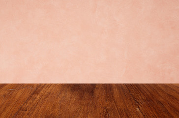 Empty wooden floors on pink wallpaper background