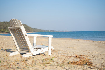 A chair on the beach In the concept of relaxing on the beach