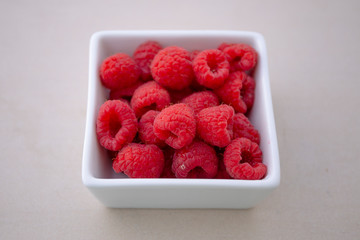 Raspberry in the square bowl