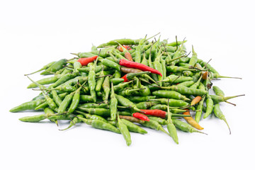 A fresh red and green bird-chilli isolated on white background