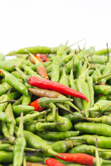A mixed fresh green and red hot bird-chilli with white space background