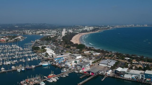 A high view of a boat harbour and coastline along the Australian sunshine coast of Mooloolaba Queensland
