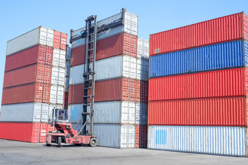 Logistics and transportation of harbor, container truck, container forklift, the concept of export and import in transportation