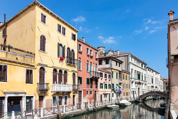 Fototapeta na wymiar Canal and Buildings in Murano outside Venice