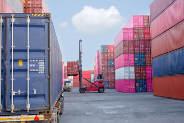 Logistics and transportation of harbor, container truck, container forklift, the concept of export...