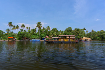 Fototapeta na wymiar River view and boat in Kerala's Backwaters, India.