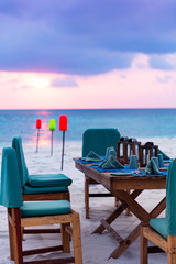 Private luxury dining experience on pristine tropical beach