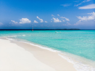 Fototapeta na wymiar Hammock on amazing white sand bar in pristine tropical waters
