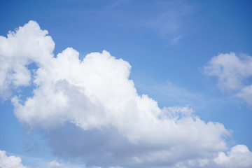 Naklejka na ściany i meble Beautiful cirrus clouds on blue sky on a sunny day background texture