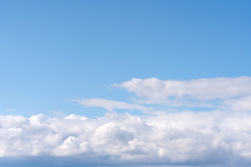 Beautiful cirrus clouds on blue sky on a sunny day background texture