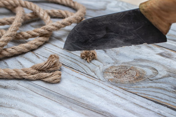 A rope and an old knife.
