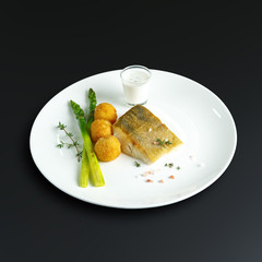 Dishes of traditional Russian cuisine. Restaurant serving. Black background.