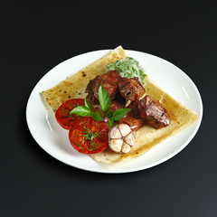 Dishes of traditional Russian cuisine. Restaurant serving. Black background.