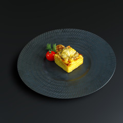 Dishes of traditional Russian cuisine. Restaurant serving. Black background.