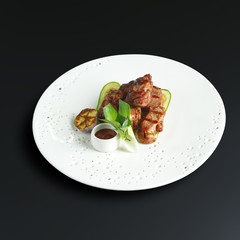 Dishes of traditional Russian cuisine. Restaurant serving. Black background.