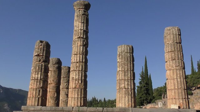 Early Morning View at the Apollo Temple in Delphi archaeological site at the Mount Parnassus. Delphi is famous by the oracle at the sanctuary dedicated to Apollo. UNESCO World heritage. Greece